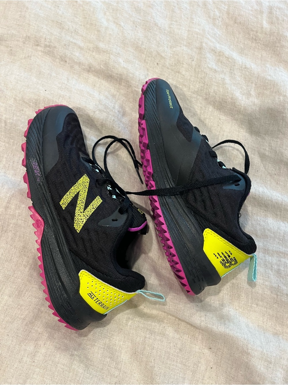 New Balance Women's Black Shoes with Yellow Heel and Pink Outsole